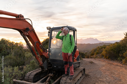 Fun hiker senior man in nature photo