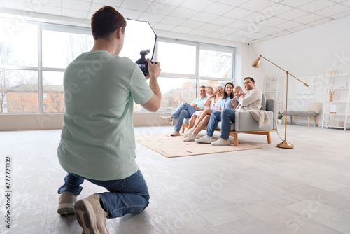 Male photographer taking pi...