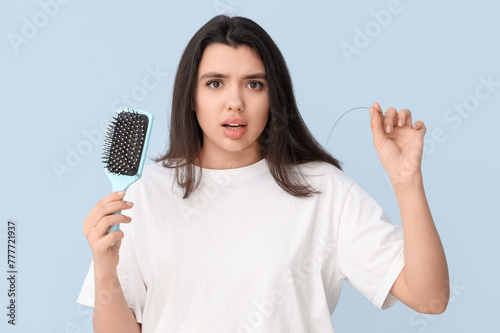 Stressed young woman with h...