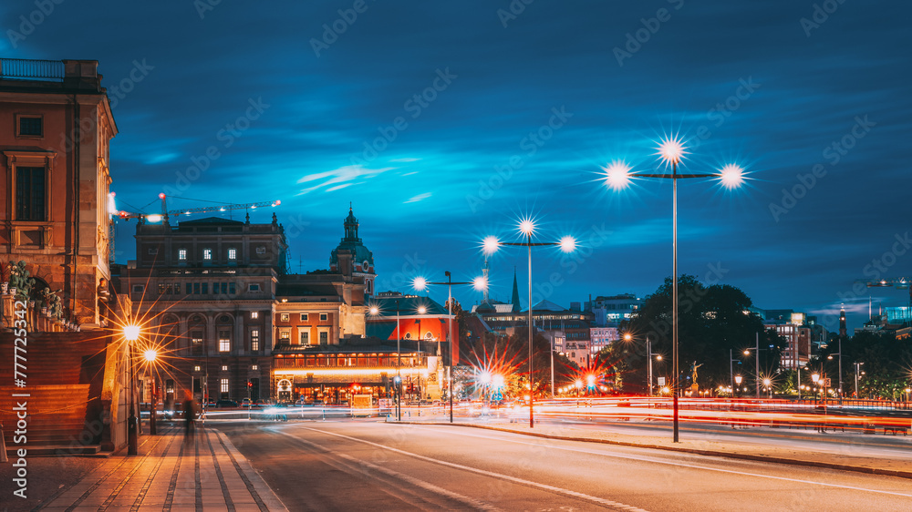 Stockholm, Sweden. Scenic View Of City Center In Sunset Twilight Dusk Lights. Evening Lighting. Skeppsbron Street. Stockholm, Sweden. Scenic View Of City Center In Sunset Twilight Dusk Lights. Evening Lighting. Skeppsbron Street.