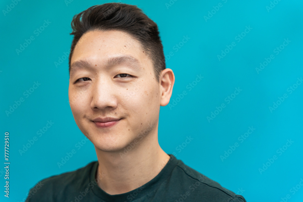 Portrait Of A Young Entrepreneur In A Blue Background. Portrait Of A Young Entrepreneur In A Blue Background.