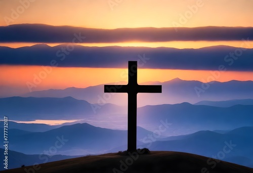 Silhouette of a cross on a hilltop with the sun setting behind it