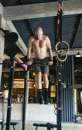 man doing CrossFit training in the gym photo