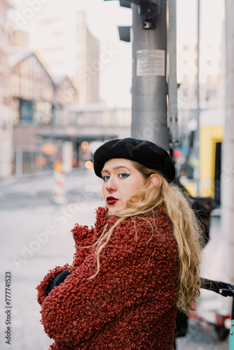 City Chic: Blond Woman in Red Faux Fur Coat  photo