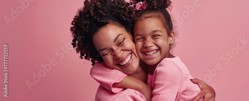 Beautiful loving mother and daughter, hugging each other, wearing pink clothes with a pink ribbon, symbol of World Breast Cancer awareness. AI generated illustration photo