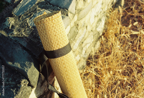 A roll of straw mat placed on the Wild Great Wall
 photo