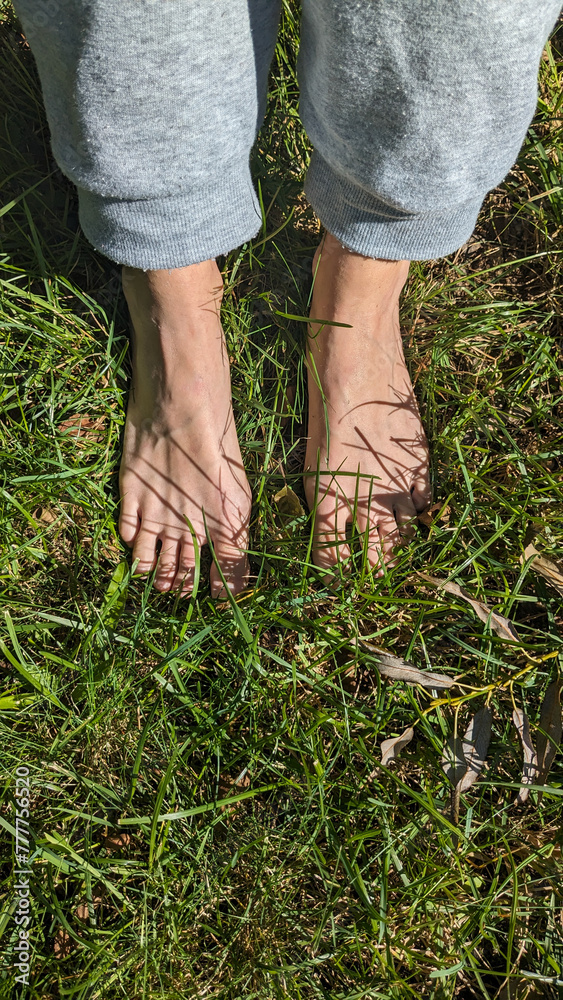UGC Earthing feet on grass UGC Earthing feet on grass