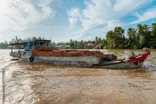 A transport boat along the waters of the River. photo