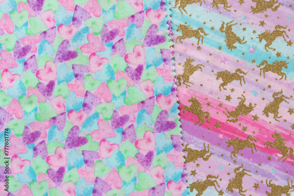 two pieces of material with prints featuring hearts and unicorns