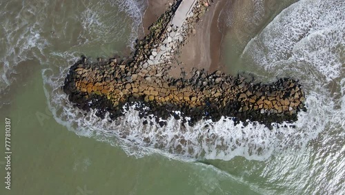 Toma aereas de drone en 4k ultrahd de playas y escolleras de Mar del Plata, Argentina. photo