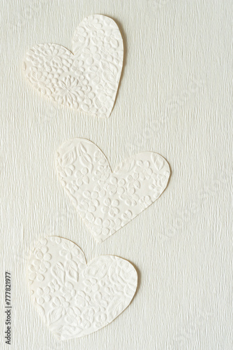 embossed floral paper hearts on crepe paper