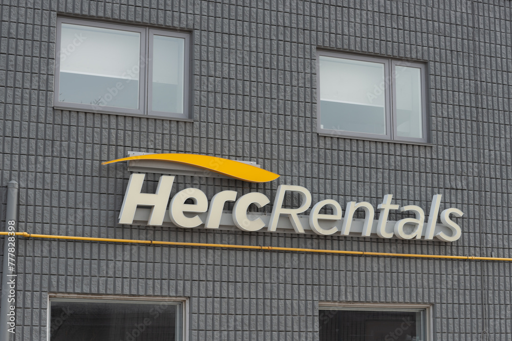 Herc Rentals Tool. Sign exterior building and sign of Herc Rentals, an equipment rental agency ...