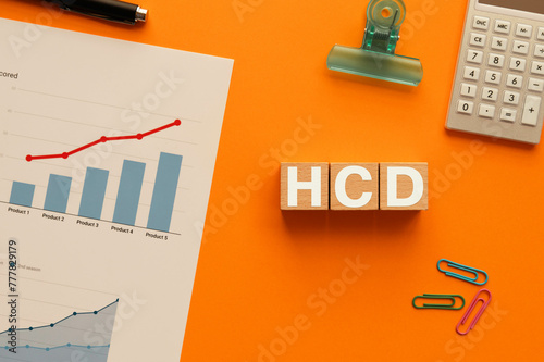 There is wood cube with the word HCD. It is an abbreviation for Human Centered Design as eye-catching image. photo