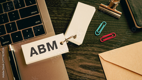 There is word card with the word ABM. It is an abbreviation for Account Based Marketing as eye-catching image. photo