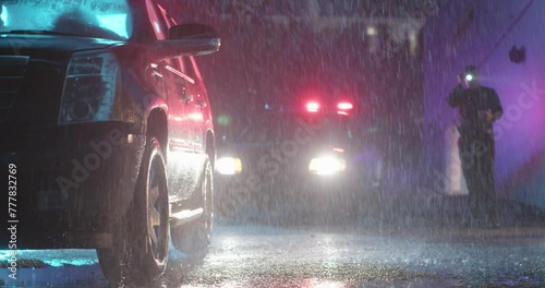 Mysterious Police Officer Pulls Over Vehicle at Night in the Rain. Heavy Rain. Shines Flashlight at vehicle.