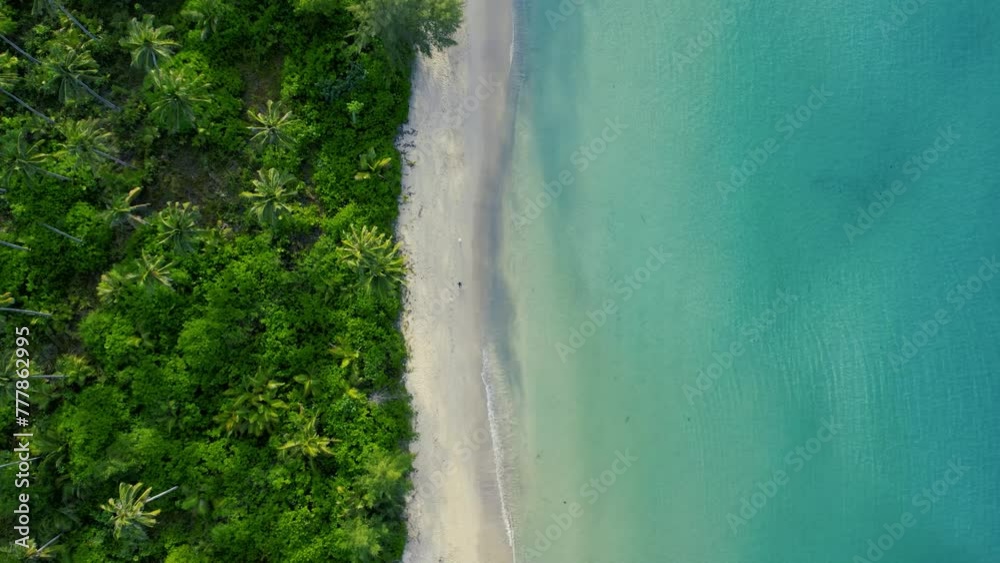 Aerial view of beautiful tropical island beach with emerald water at Koh Kood Thailand.