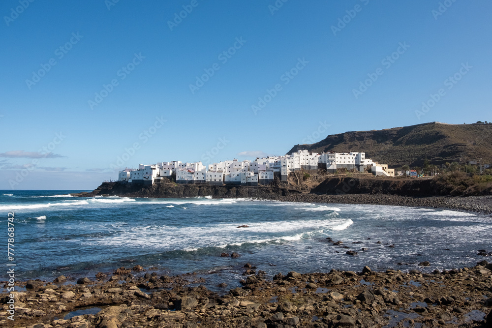 Coastal town of white houses next to the sea. Coastal town of white houses next to the sea.