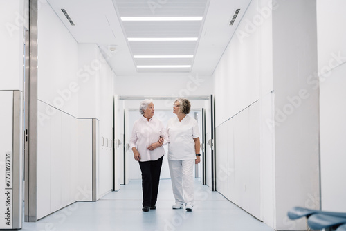 nurse caring to patient in the emergency room photo