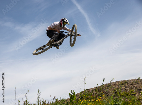 Boy on mountain bike photo