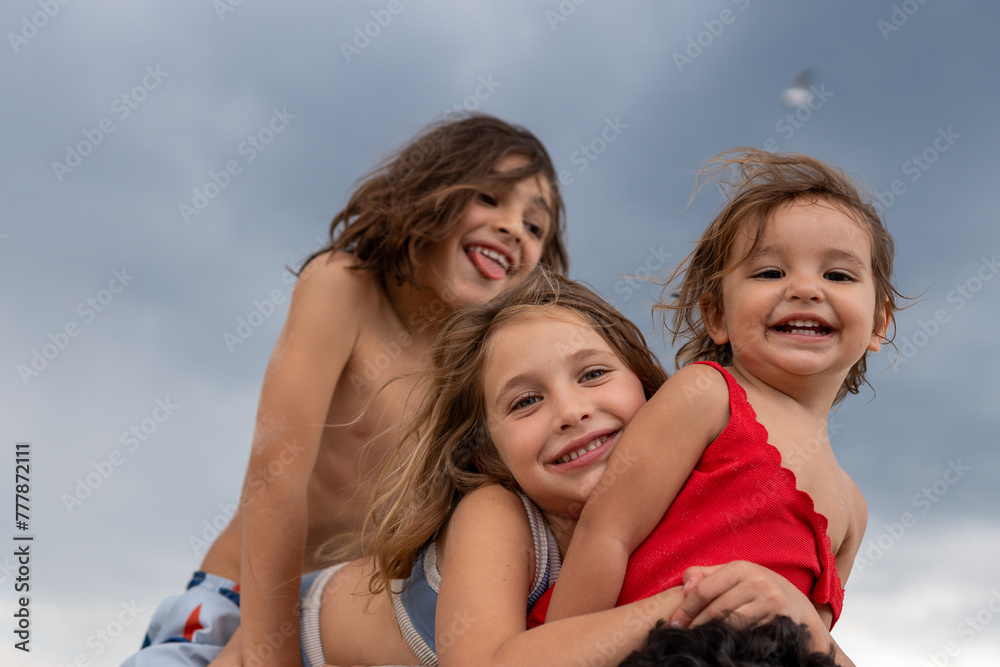 Kids on daddy's back Kids on daddy's back