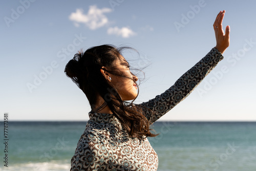 Woman at sunny beach photo