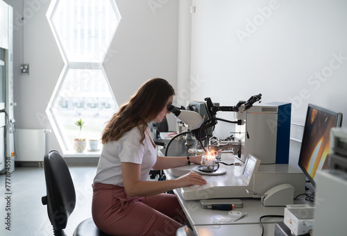 Scientist Working With High Resolution Microscope
