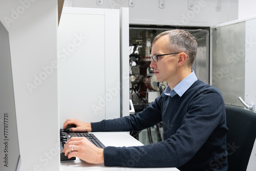 Man Working At Lab of Characterisation of Materials Structure photo