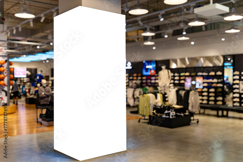 Mockup Blank space of tall light box Four sides around the pole in shopping mall