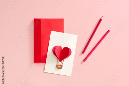 Creative composition with hot air balloons made of paper heart photo