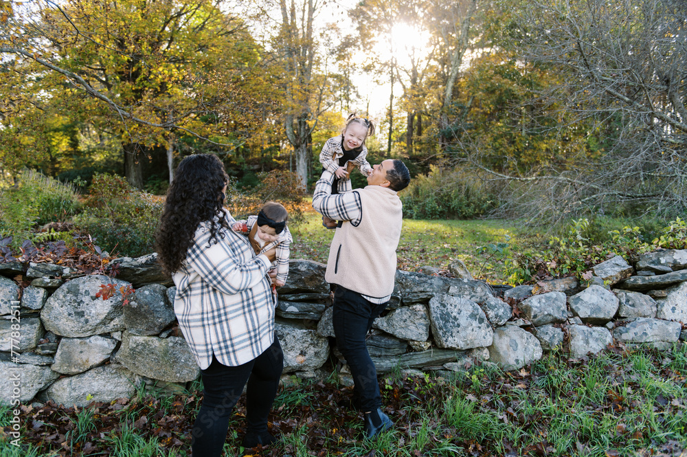 happy family with two moms and two daughters outdoors in autumn happy family with two moms and two daughters outdoors in autumn