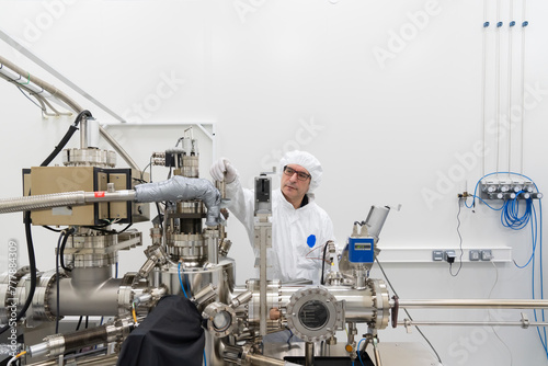 Scientist Working With Molecular Beam Epitaxy System.