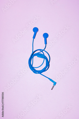  Blue wired headphones with hard direct flashlight