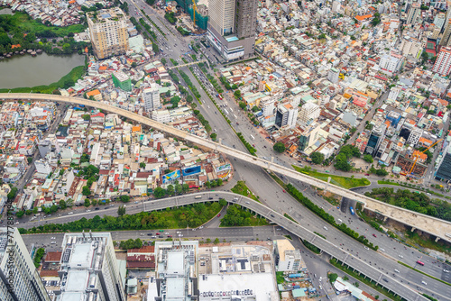Aerial view of a busy city centre with overlapping roads and bridges at Ho Chi Minh City in Vietnam