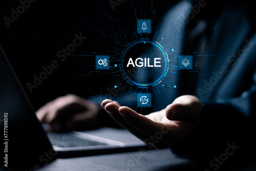 Agile development methodology concept. Iterative methods. reducing step by step work and focusing on team. Businessman with Agile icon on virtual screen.