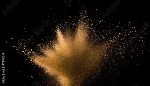 sand particles explosion on black background