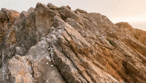 detailed close up of a rugged rock formation stone texture rock formation natural cliff pattern rough wallpaper brown and gray panorama ai