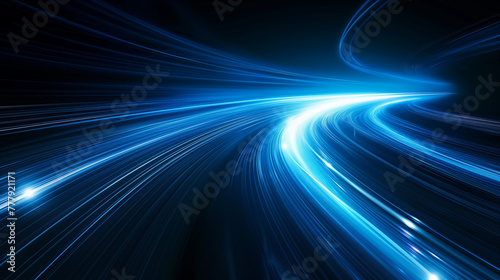 digitally generated image of blue light and stripes moving fast over black background. photo