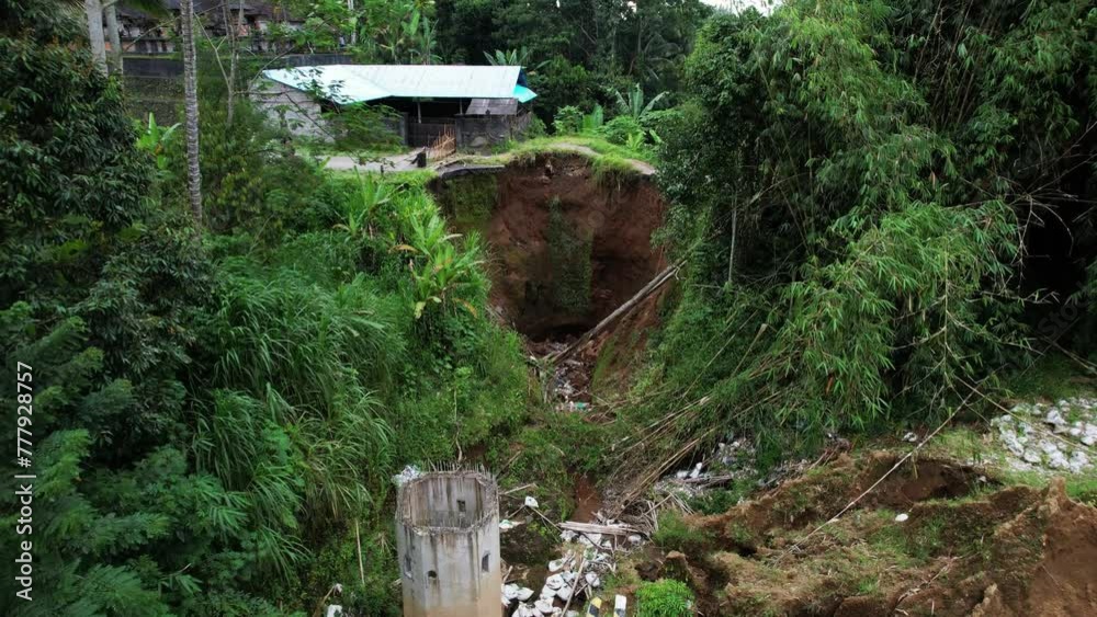 After earthwork, rainy season caused soil erosion and roadbed was ...