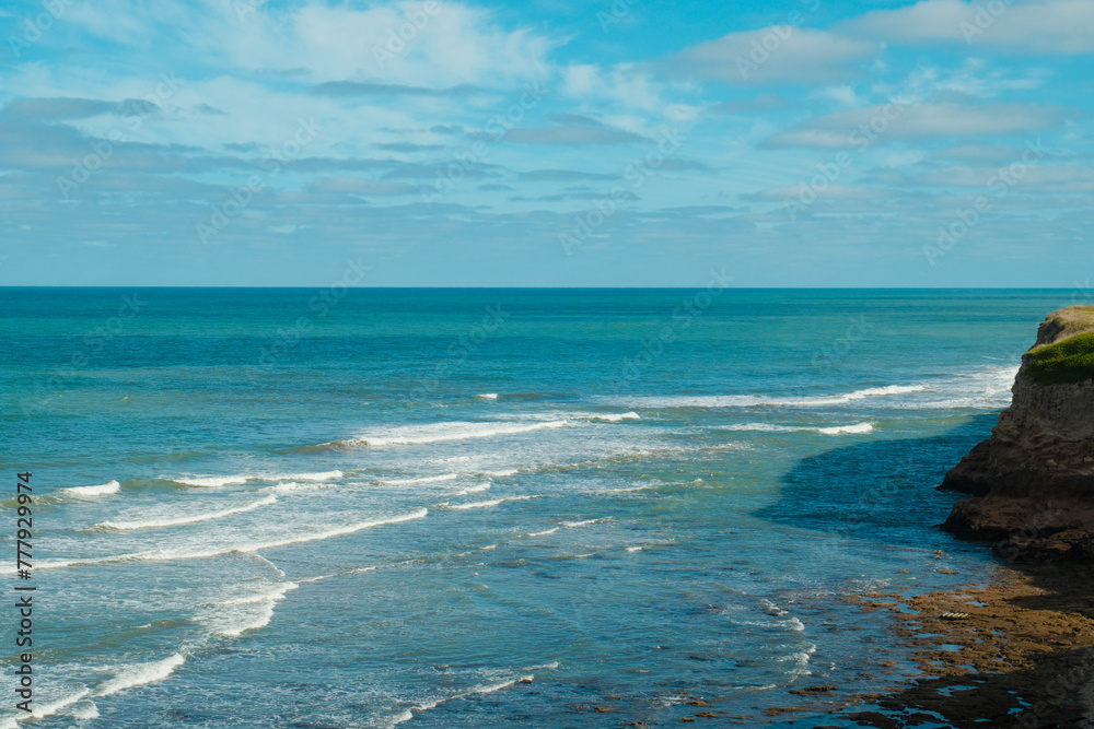 Waves and foam on the coast of the Atlantic Ocean, Argentina, Buenos Aires province, Mar Del Plata