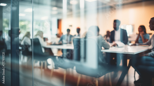 Business Meeting Behind Glass Wall - Corporate Teamwork and Office Dynamics - blurry out of focus workplace collaboration image.