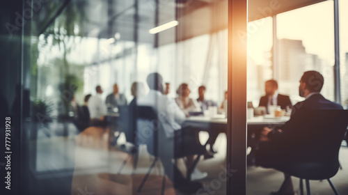 Business Meeting Behind Glass Wall - Corporate Teamwork and Office Dynamics - blurry out of focus workplace collaboration image.