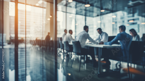 Blurry Office Meeting Through Glass Wall: Focusing on Corporate Teamwork and Workplace Dynamics.