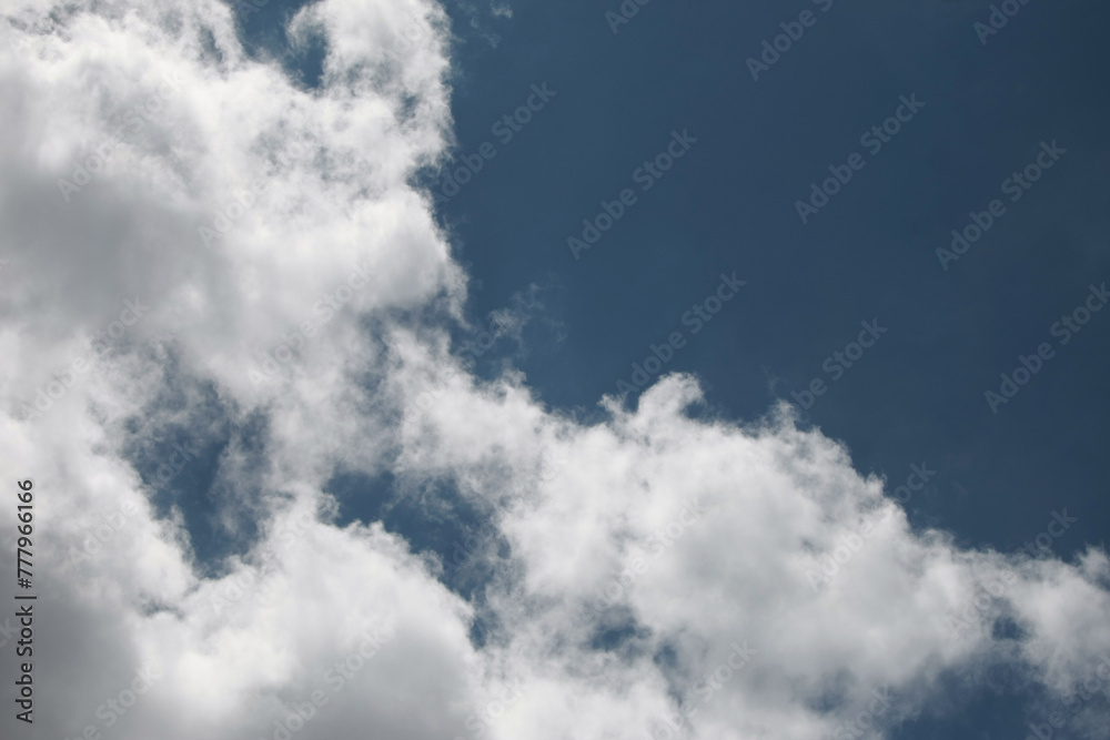 Obraz premium Clouds on the blue sky nature with space background wallpaper