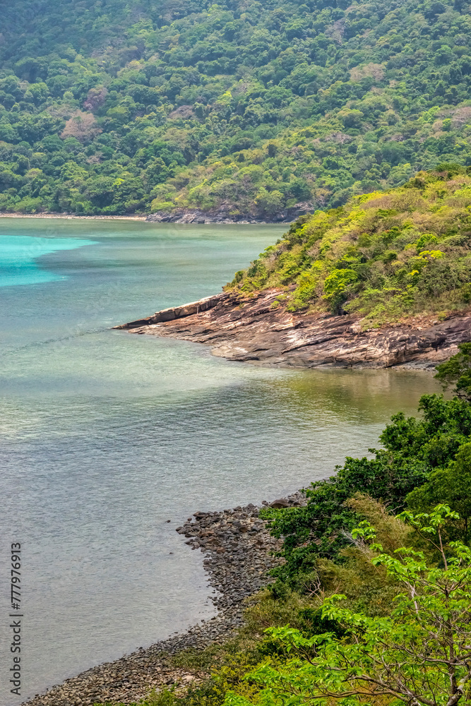 Obraz premium Mr Cau beach or Bai Ong Cau and mangroves on Con Dao island, Ba Ria Vung Tau, Vietnam. View from road around the island 