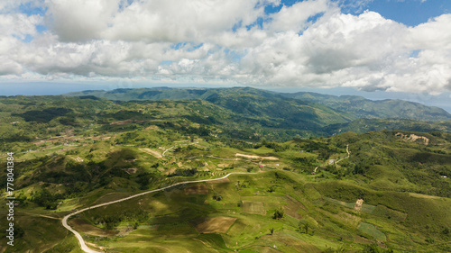 Agricultural land among hills and mountains in a mountainous province. Libo hills. Cebu island, Philippines.