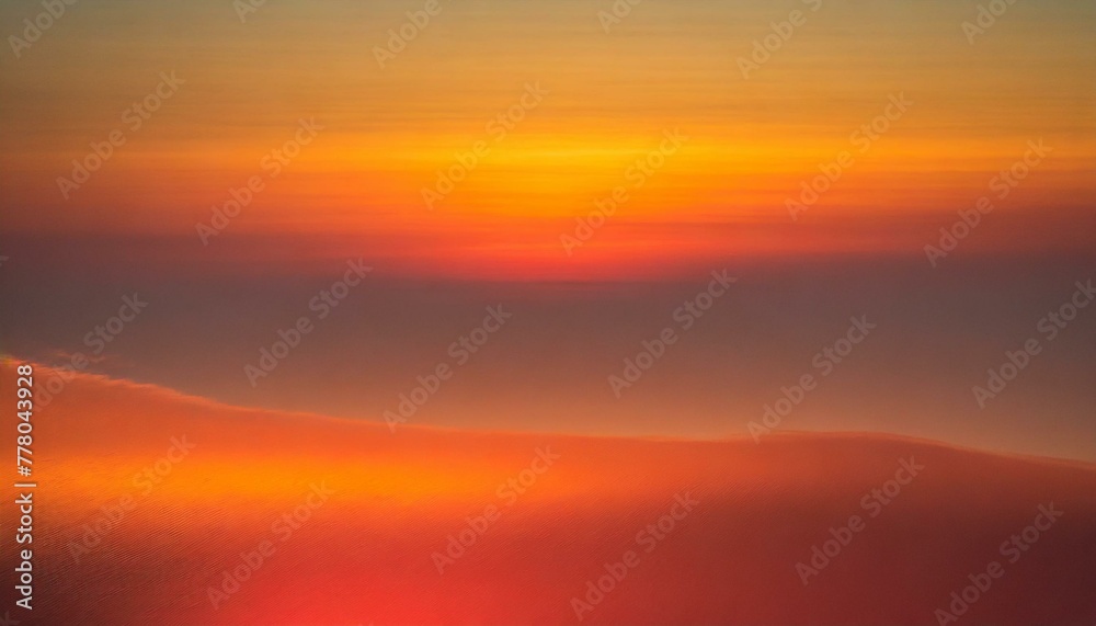 A warm, abstract background evoking the feeling of a sunset