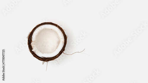 Creative layout made of coconut. Flat lay. Food concept. Macro concept. Coconut half on white background. Minimal concept. Flat lay. 
