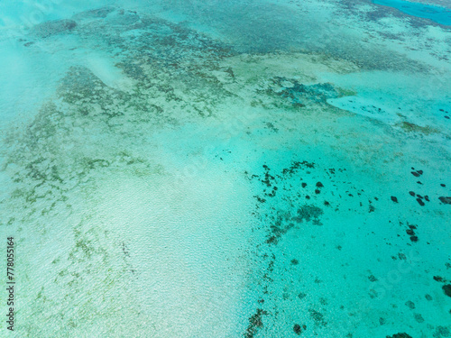 Lagoon surface on atoll and coral reef view from above. Balabac, Palawan. Philippines.