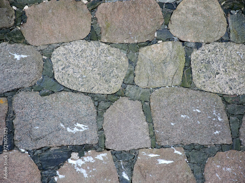 Texture of processed stones in ancient stonework