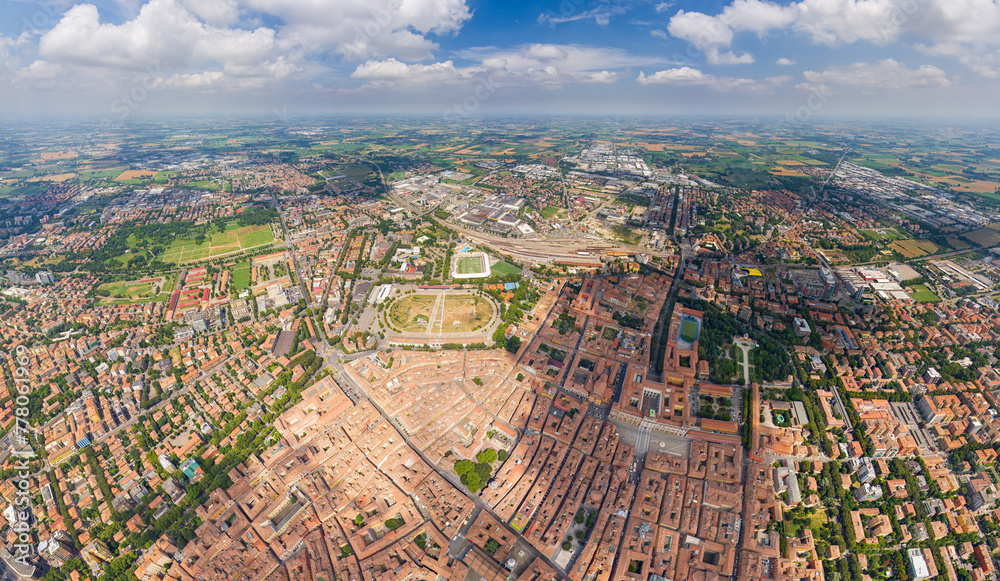 Modena, Italy. Historical Center. Panorama of the city on a summer day. Sunny weather with clouds. Aerial view